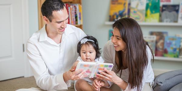 Family reading with toddler