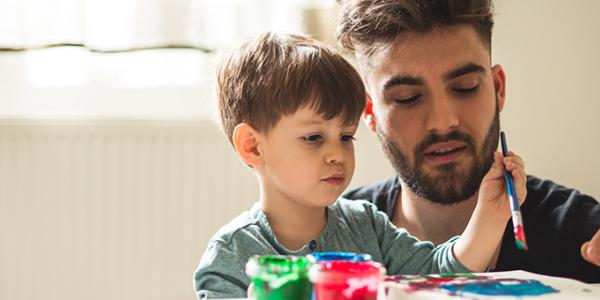 Father and son painting