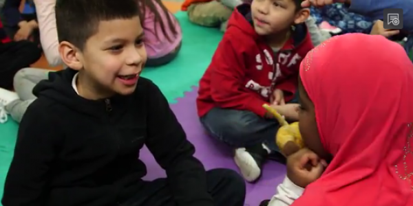 Children talking in classroom