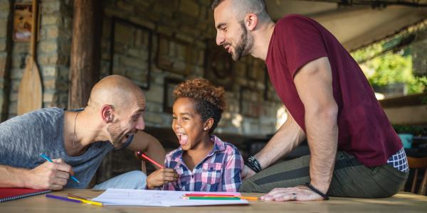 Parents working with their son.