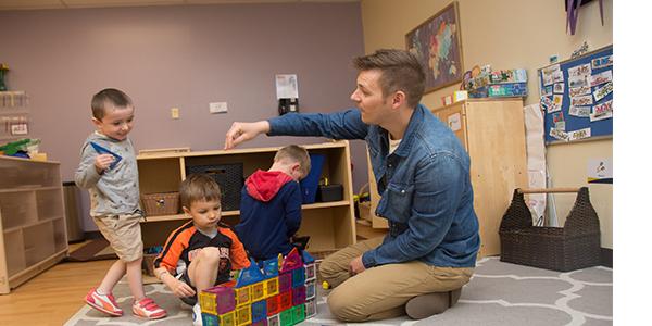 Teacher playing with students