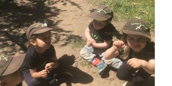 Children sitting on the ground