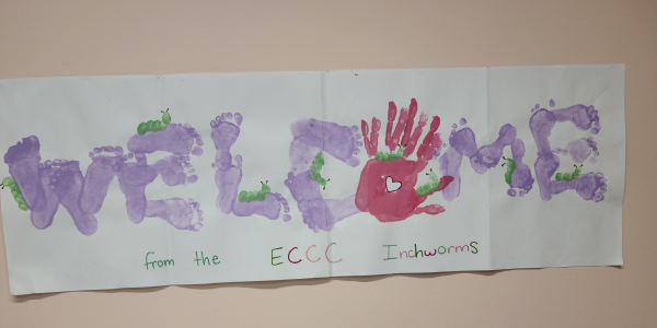 childrens artwork depicting the word "welcome"