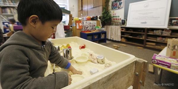 Child playing in a sandbox