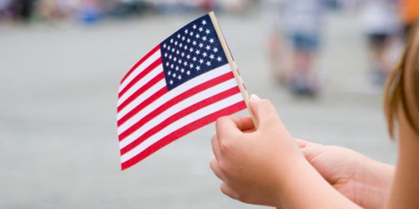 Girl holding the American flag