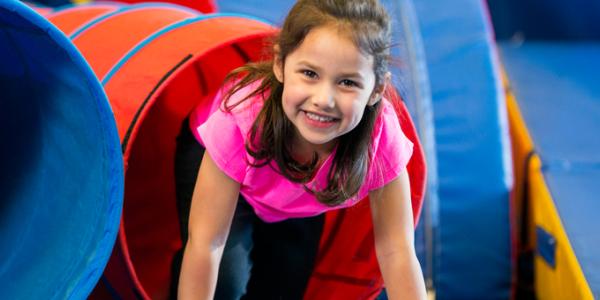 Young girl smiling during play