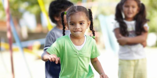 Young child playing outside