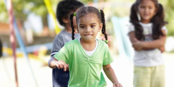 Young child playing outside