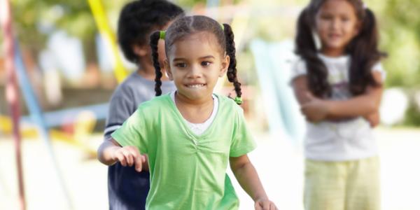 Children interact on a playground.