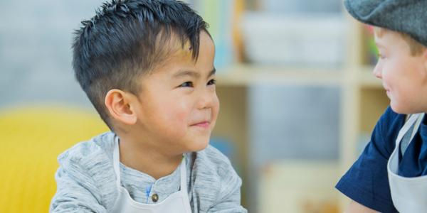 Two preschool boys smiling