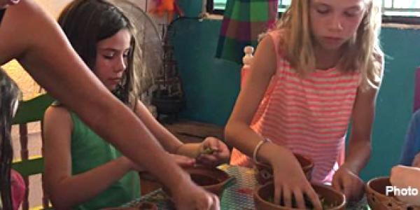 Children learning how to cook