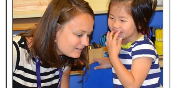 Teacher listening to a child's story