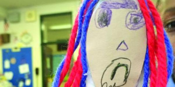 Children create peace puppets to support their developing social and emotional skills