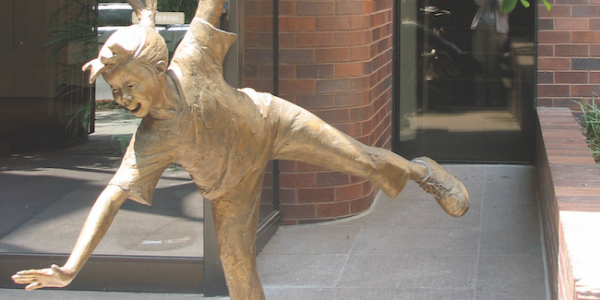 Golden child statue outside NAEYC headquarters