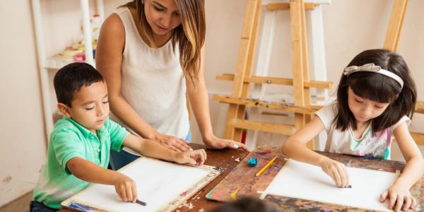 Children drawing in an art studio