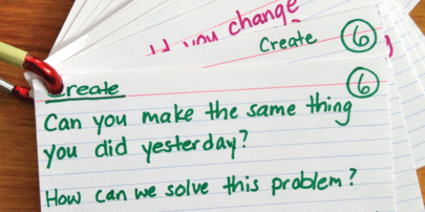 Index cards with sample questions for children.
