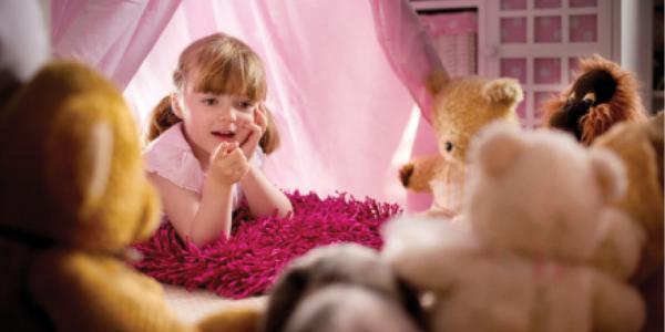 Child and her stuffed animals