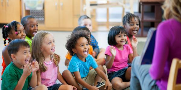 Young children enjoying a read aloud