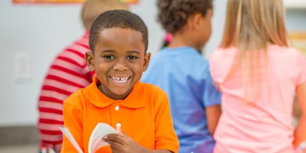 A young boy enjoying a book