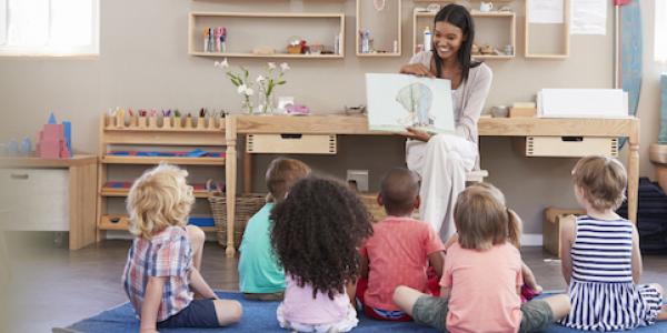 Teacher reading a book during storytime