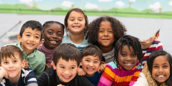 A group of children posing for a picture