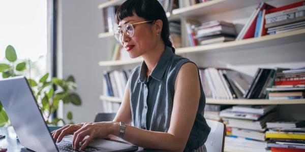 Woman working on a computer in an office