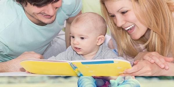 Parents reading to a baby