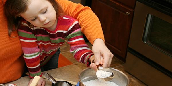 Mother and daughter baking