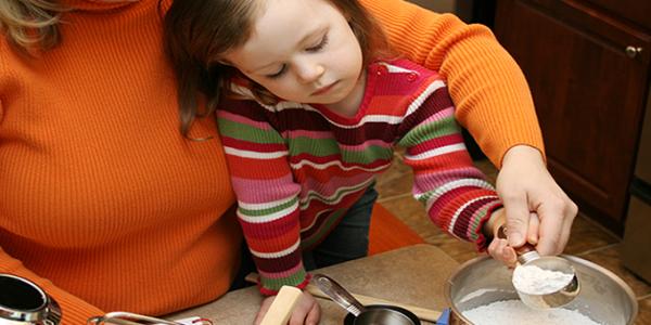 Mother and daughter baking