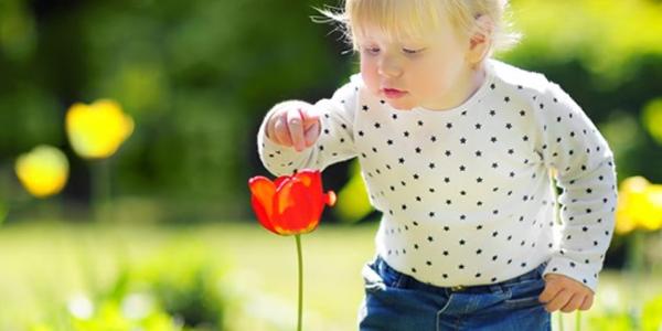 child with flower