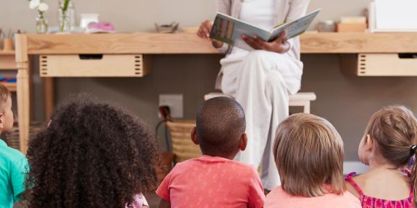 Teacher reading a book during storytime
