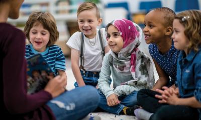 Children gathered on the carpet during storytime