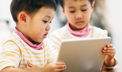 Two boys with ipad