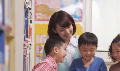 Teacher with early childhood students