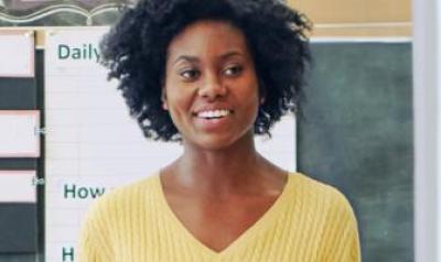 A woman in a classroom environment