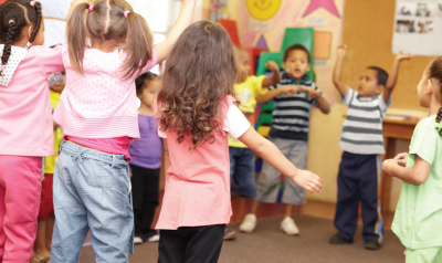 a group of children dancing