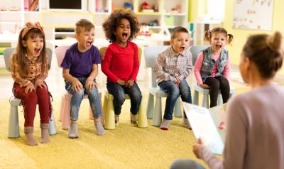 Children participating in a group lesson