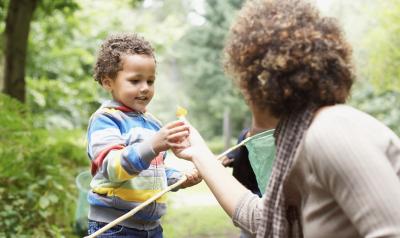 A woman and child learning outdoors
