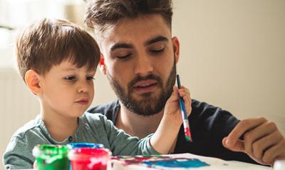 Father and son painting
