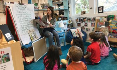 Classroom sitting in a circle during storytime