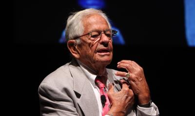 Dr. T. Berry Brazelton speaking at a conference.