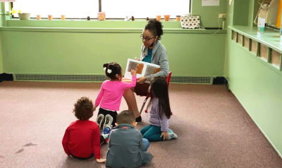 a teacher reading to children