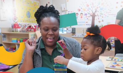 A teacher working with a student in the classroom