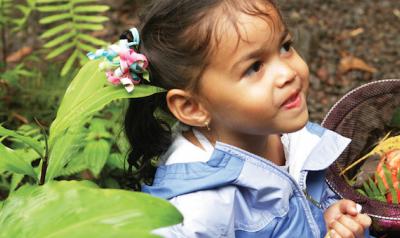 Girl exploring during nature play