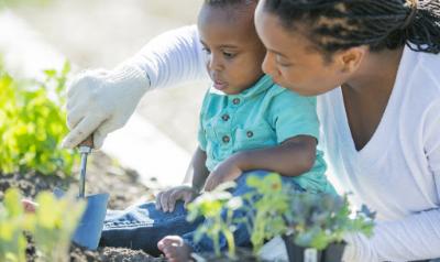 Mother and toddler in the garden