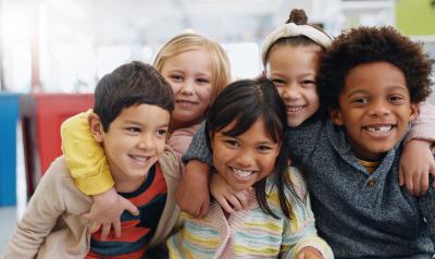 children smiling together in school
