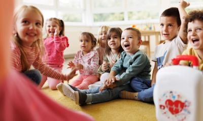 Children celebrating in a classroom