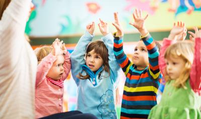 A group of children participating in a lesson 