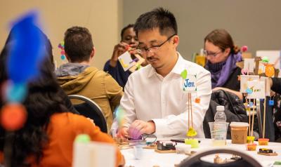 NAEYC Annual Conference attendees learning to make and tinker in a pre-conference workshop. 