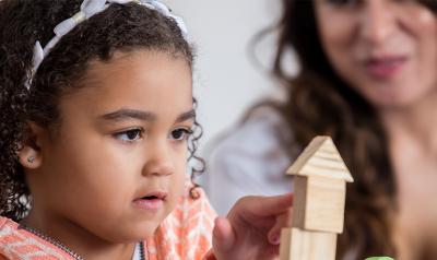 a child playing with blocks